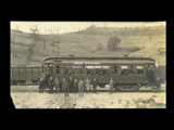 Monongahela Valley Traction Company inspection party and train car. First car to Carolina. Cars of Western Maryland Railroad behind.