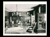 Library at Mount de Chantal Visitation Academy in Wheeling. Chairs, books in bookcases.