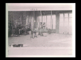 Interior of Lee Purpura's machine shop in alley between 16th and 17th streets.