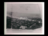 Detail of right side of panoramic of Wheeling (0006 04) showing buildings and bridges across river.