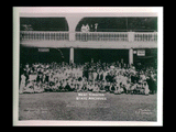 Fifth Annual Outing of Stone and Thomas employees at Wheeling Park. Large group of people assembled in front of building. Signs for Entrance to Lunch Room, Restaurant Regular Meals Popular City Prices.