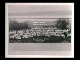 Second Annual Outing of Stone and Thomas employees at Ridge Crest Farm of Mr. Stone at Short Creek. Large group of people with hillside in background.