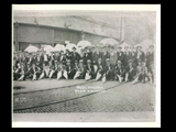 Group of stogie makers on Labor Day posed in front of the Union Automobile Company on 16th Street in Wheeling. Right cirkut of panoramic.