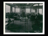Welding shop at Wheeling Steel with men at work.