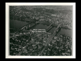 Aerial of Wheeling showing closer view of three bridges to Wheeling Island. Appears identical to CL20-0127.