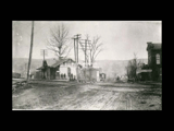 The B&O Railroad station in Elm Grove. Sign for Pryor and Woods.